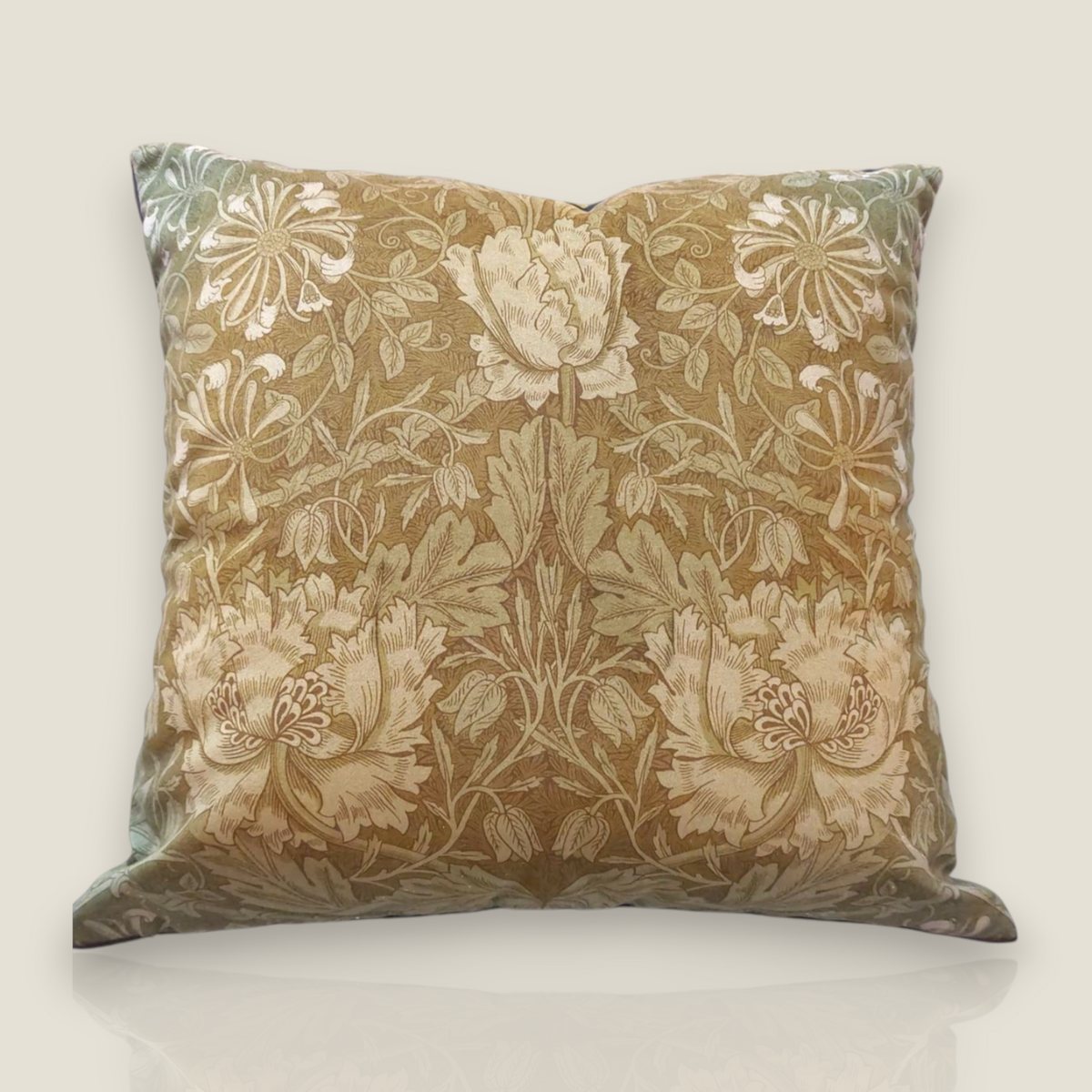 Depuis des lustres square velvet cushion in olive green and gold with a dense floral Arts and Crafts botanical print.