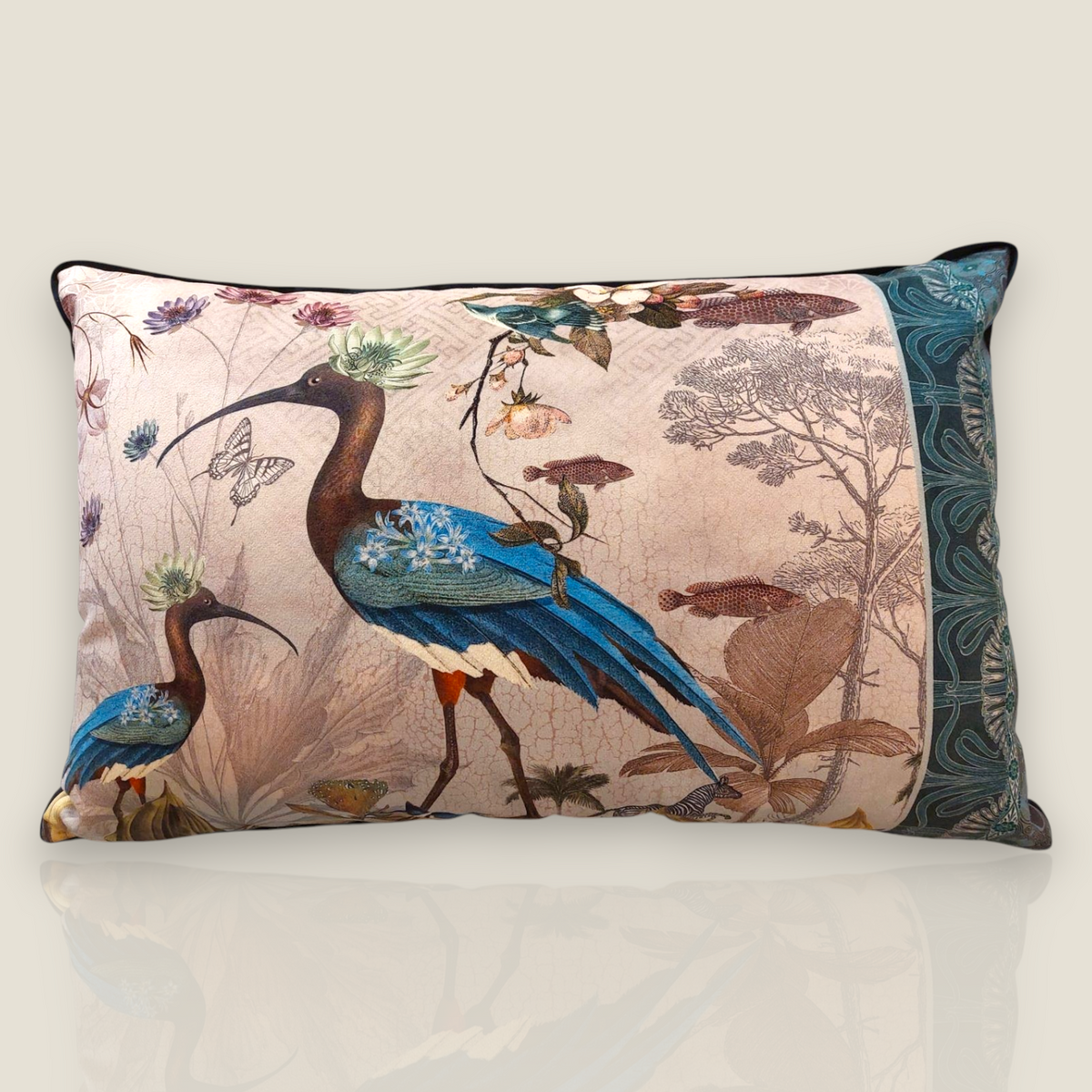 Depuis des lustres IOA velvet cushion featuring a naturalist print of birds, butterflies, and plants on a beige background