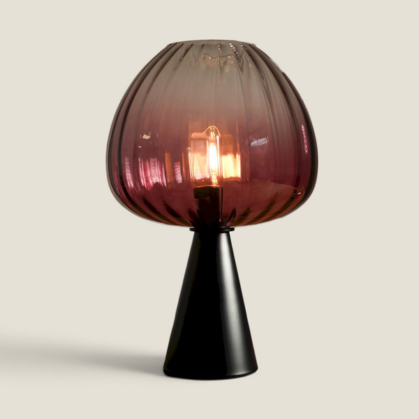 Depuis des lustres DRIMMER Donia table lamp with a ribbed pink gradient glass globe and a matte black metal base.