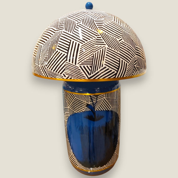 Depuis des lustres DRIMMER ceramic table lamp with blue apple motif, geometric dome shade, and gold trim details.