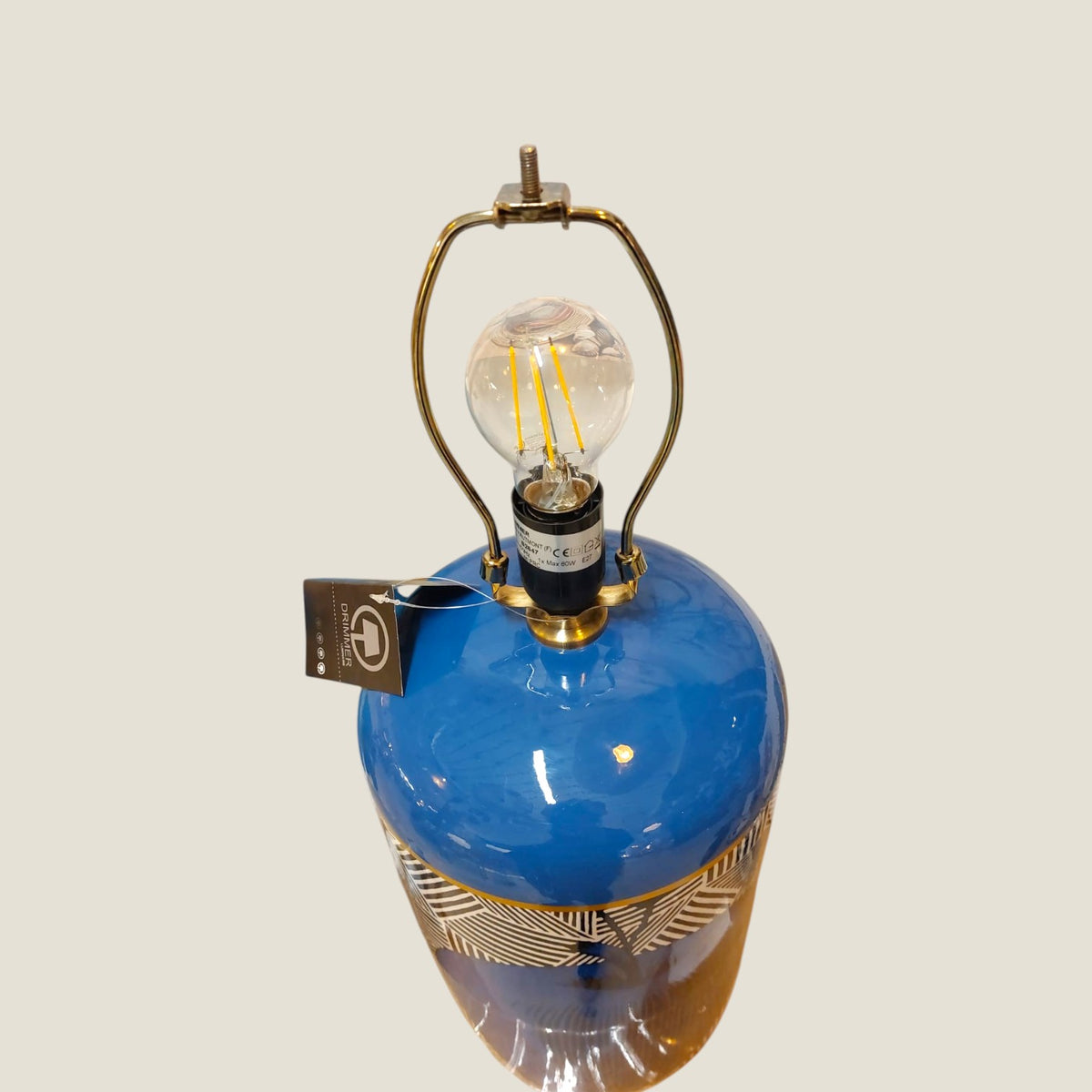 Depuis des lustres DRIMMER Granny ceramic table lamp with cobalt blue base, geometric patterns, and gold trim.