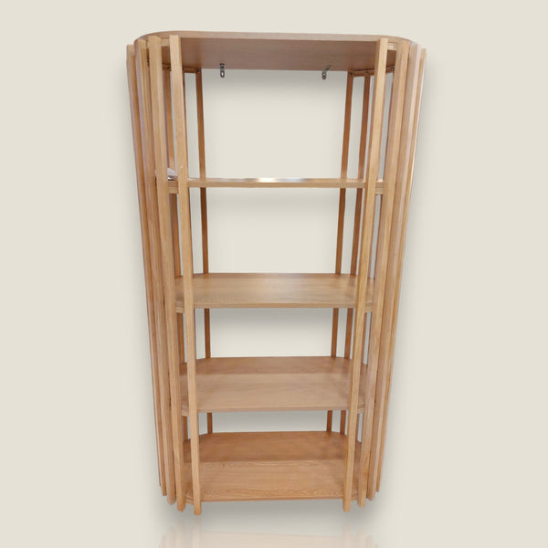 Depuis des lustres oval wooden shelving unit with slatted vertical supports and four tiers for contemporary storage.