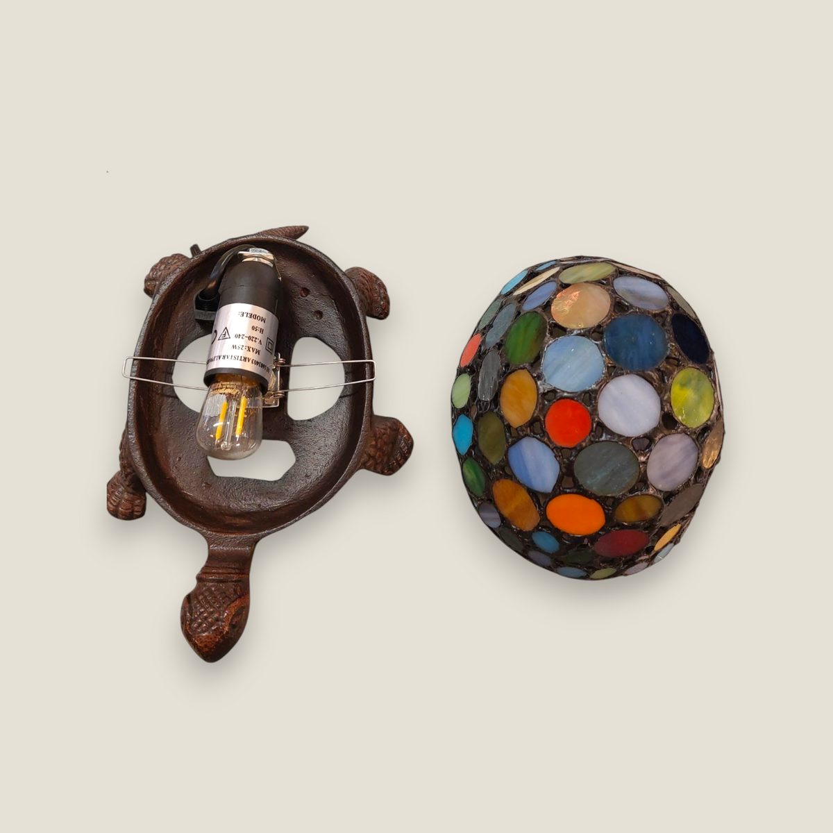 Depuis des lustres Tiffany style turtle lamp with a colorful stained glass shell and bronze-look resin base