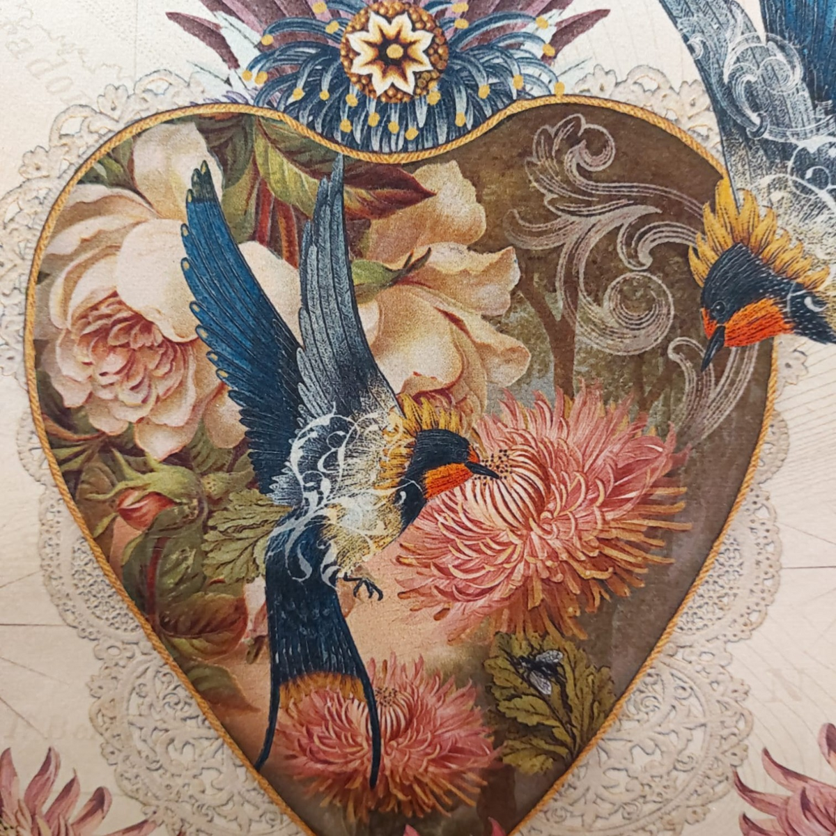 Depuis des lustres velvet cushion featuring vintage botanical and bird illustrations in warm tones with heart motif