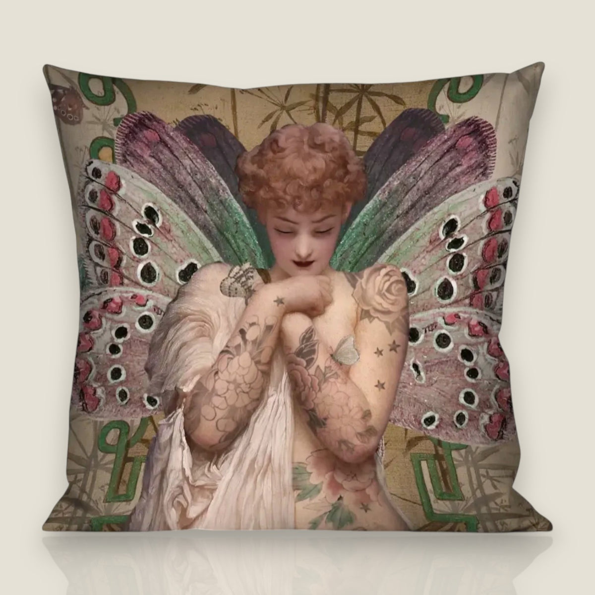 Depuis des lustres Voglio Bene Angel velvet cushion with tattooed winged figure, floral sepia background and black trim.