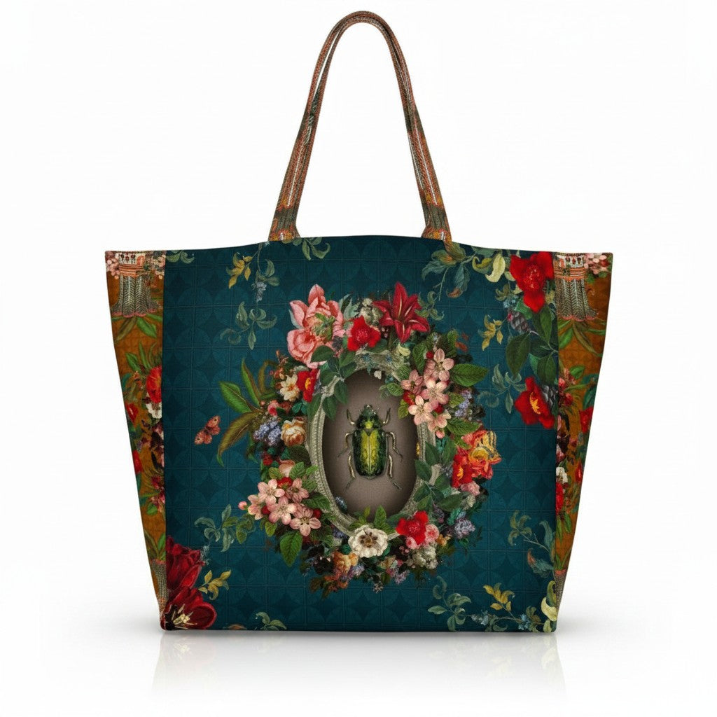 Depuis des lustres Voglio Bene tote bag with baroque beetle illustration, floral wreath, and peacock blue background.