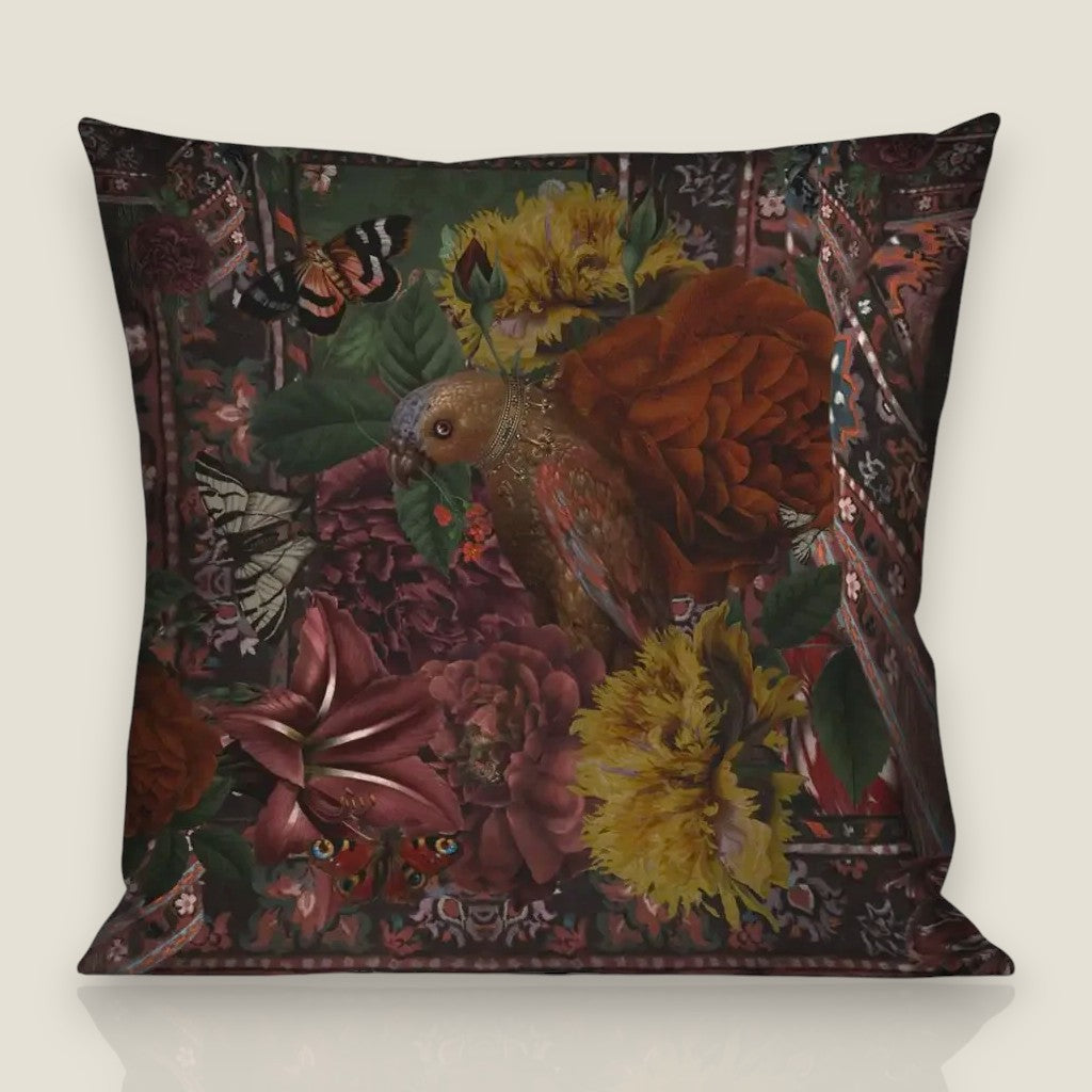 Depuis des lustres Voglio Bene Le Sultan velvet cushion with floral, parrot, and oriental rug patterns on deep green