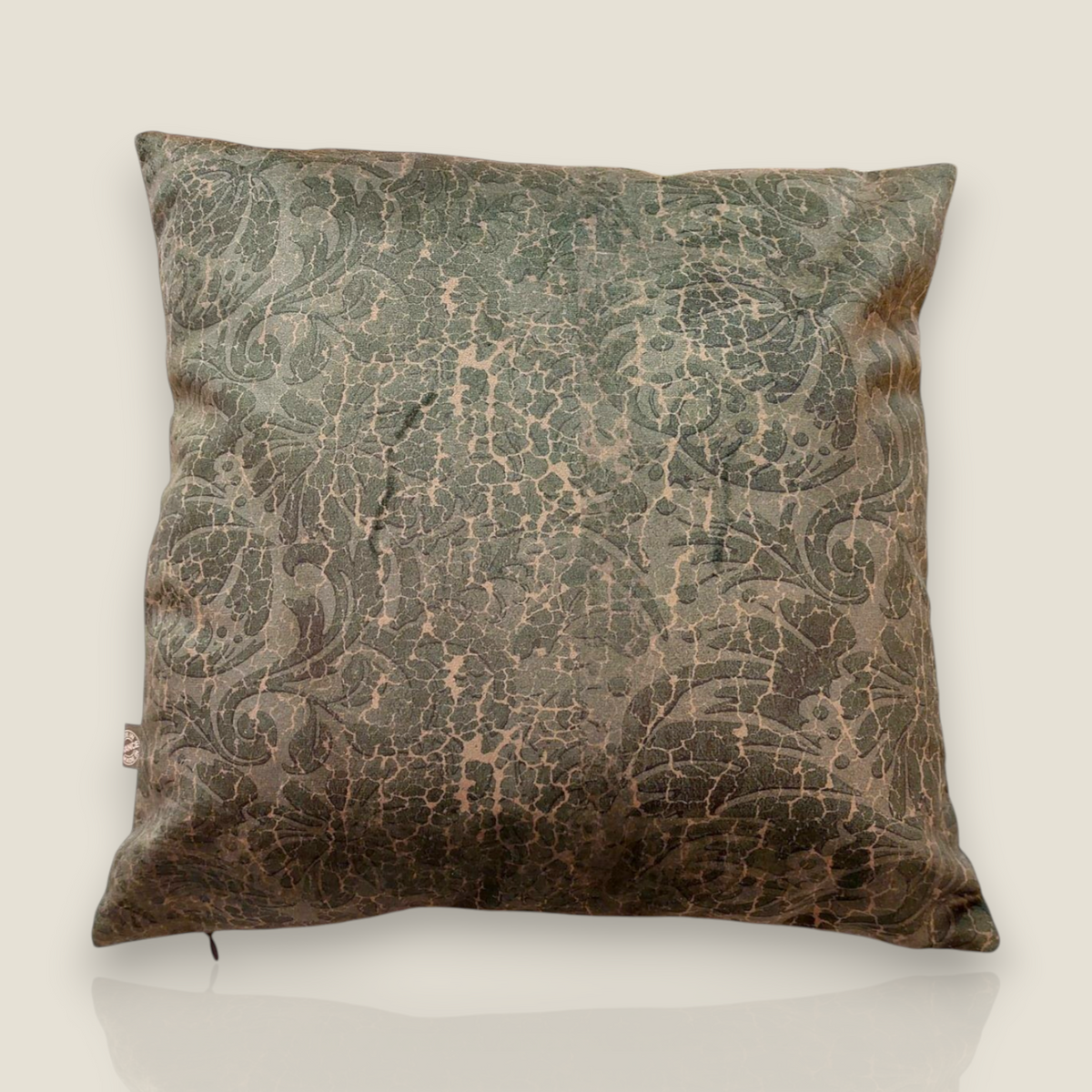 Depuis des lustres OIA velvet cushion in khaki green with a vintage baroque crackled pattern and floral details.